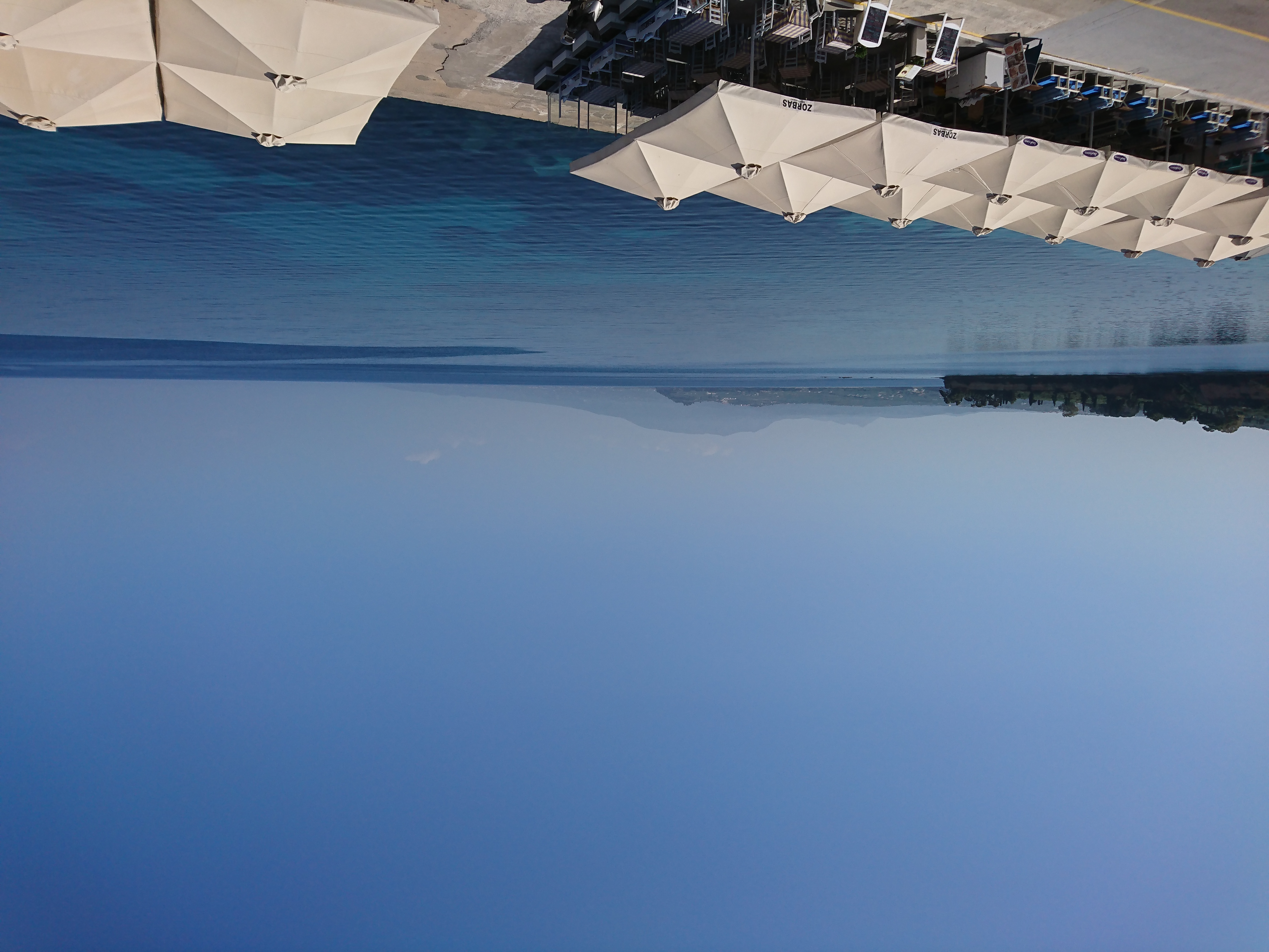 Wide sea panorama with cape and mountains